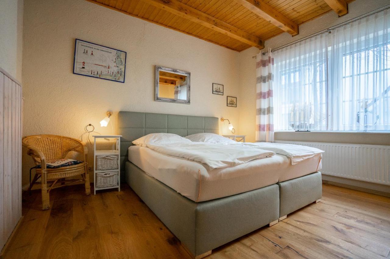 Апартаменты Godewind Haus Wattwurm Бюзум Экстерьер фото